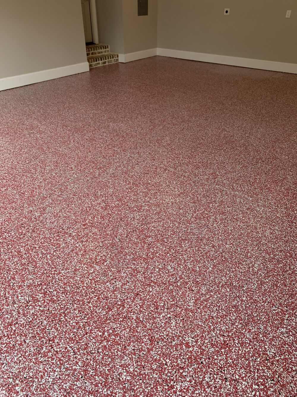 Red flake floor coating installed with Citadel Floors system
